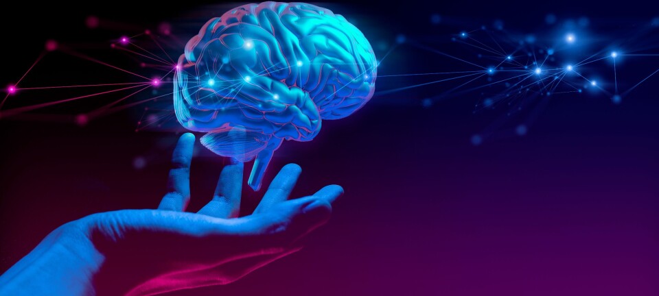Doctor holding a holographic of human brain in healthcare