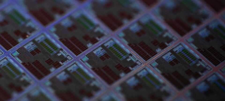 Macro Shot of a Silicon Wafer with Computer Chips during Manufacturing Process at Fab or Foundry. Semiconductor Wafer Texture.