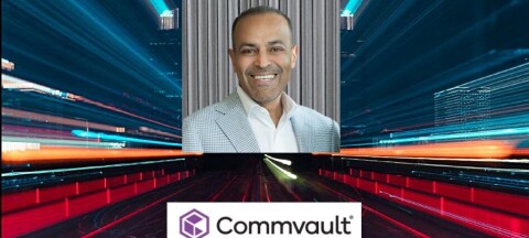 Commvault logo and a CEO Sanjay Mirchandani.
 on a neon digital grid background