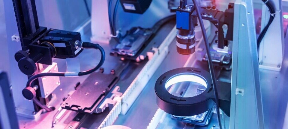 Robotic machine vision equipment inspecting parts on a smartphone assembly line